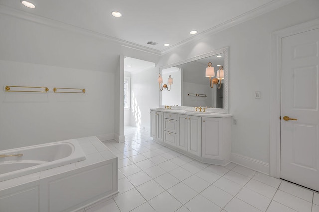 bathroom featuring vanity, ornamental molding, a bathing tub, and tile patterned flooring