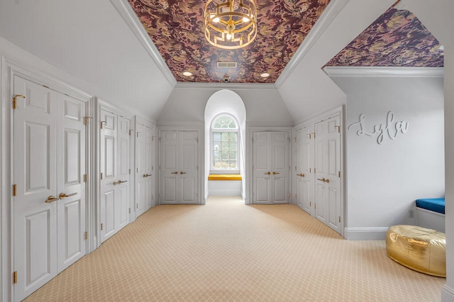 corridor with lofted ceiling, light colored carpet, and crown molding