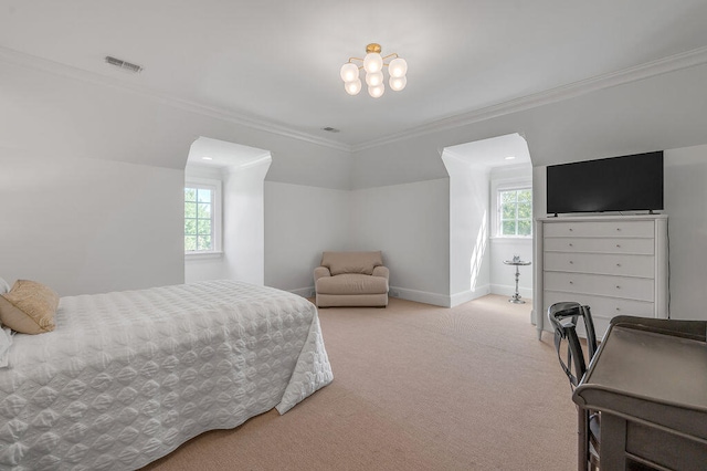 bedroom with light carpet and crown molding