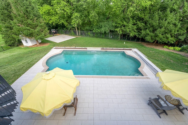 view of pool featuring a patio and a lawn