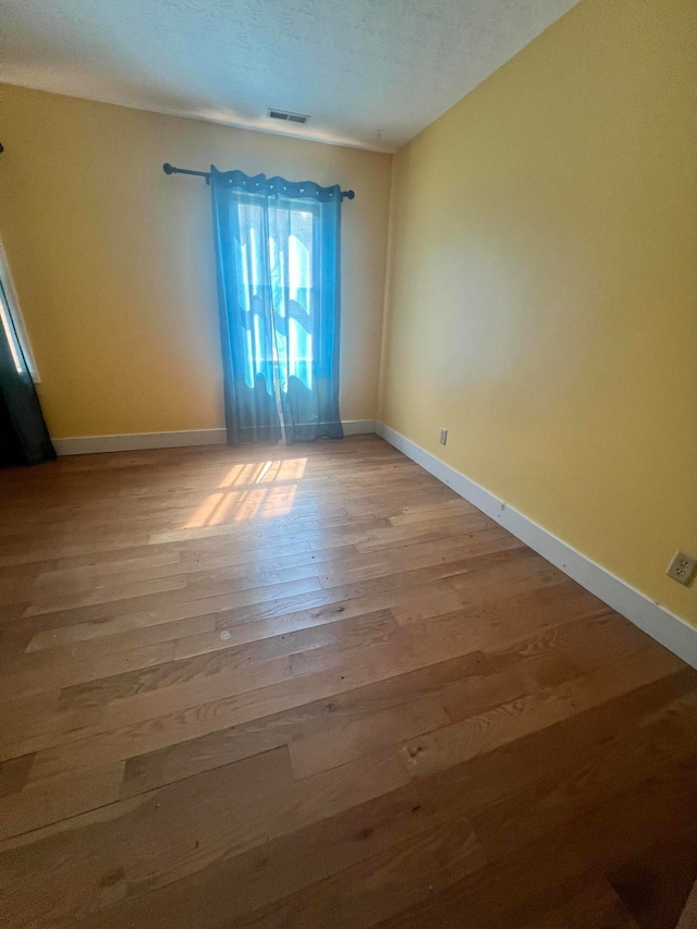 empty room featuring light wood-type flooring