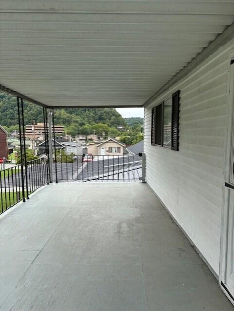 view of patio / terrace featuring a balcony