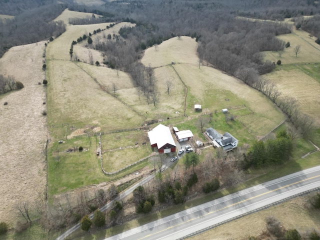 birds eye view of property featuring a rural view