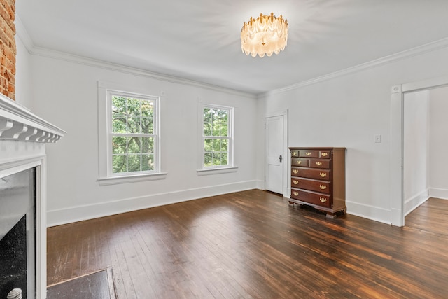 unfurnished living room with crown molding and dark wood-type flooring