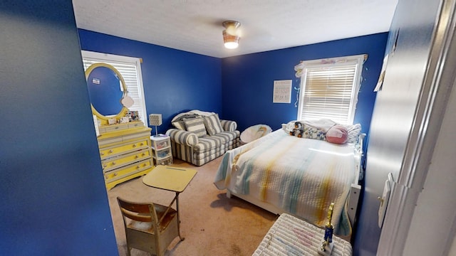 bedroom featuring carpet floors and ceiling fan