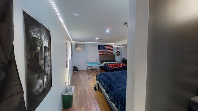 bedroom featuring wood-type flooring