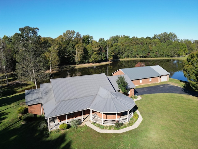 drone / aerial view with a water view