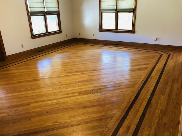 empty room featuring light wood-type flooring