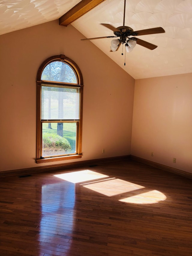 unfurnished room with lofted ceiling with beams, ceiling fan, and dark hardwood / wood-style flooring