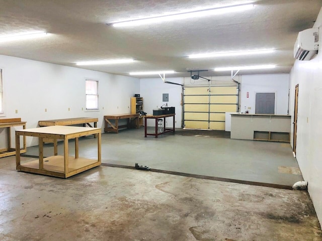 garage featuring an AC wall unit