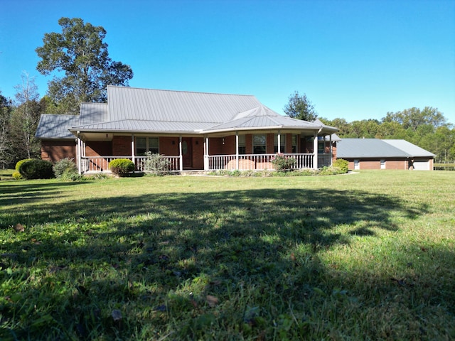 farmhouse with a porch and a front lawn