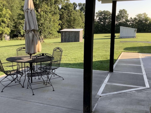 view of patio / terrace featuring a storage unit