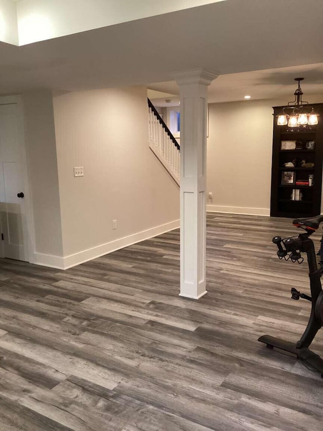 basement featuring dark wood-type flooring