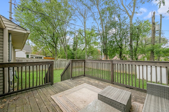 deck featuring a lawn