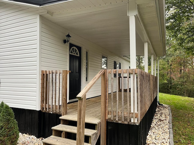 wooden terrace featuring a porch