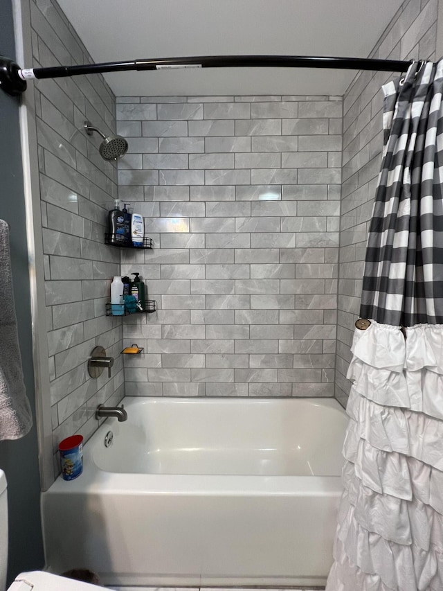 full bath featuring shower / bath combination with curtain