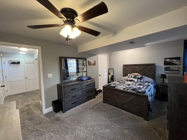 bedroom with baseboards, a ceiling fan, carpet flooring, and visible vents