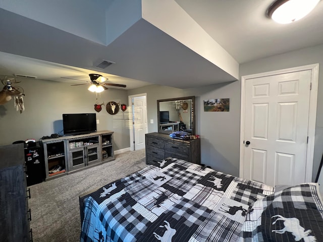 bedroom featuring ceiling fan and carpet floors