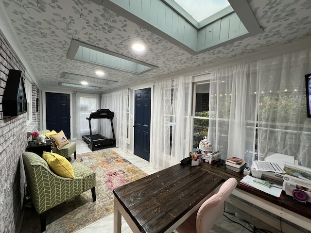 sunroom with a skylight