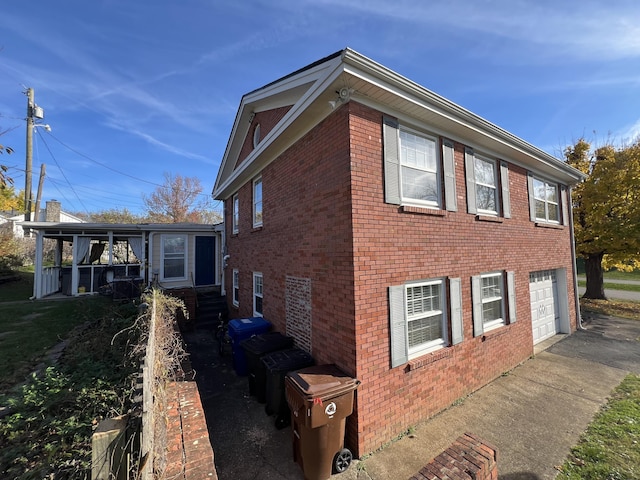 view of property exterior featuring a garage