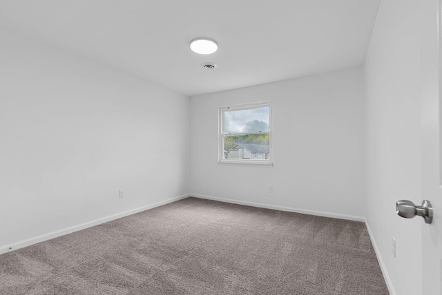 unfurnished room with carpet floors