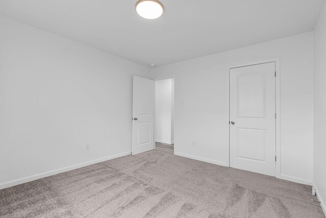 unfurnished room with carpet