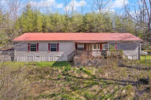 view of front of home with a deck