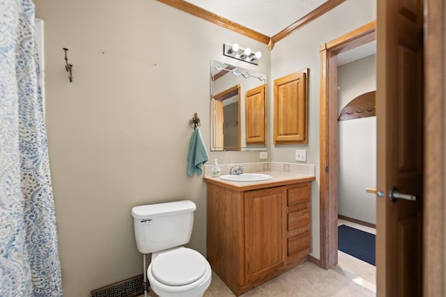 bathroom with vanity, crown molding, toilet, and tile patterned flooring