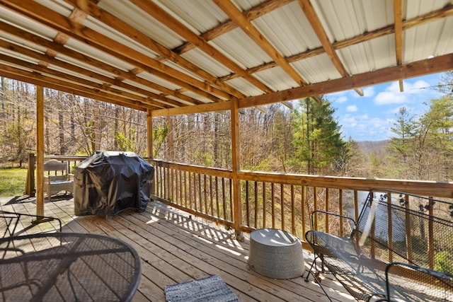 wooden deck featuring grilling area