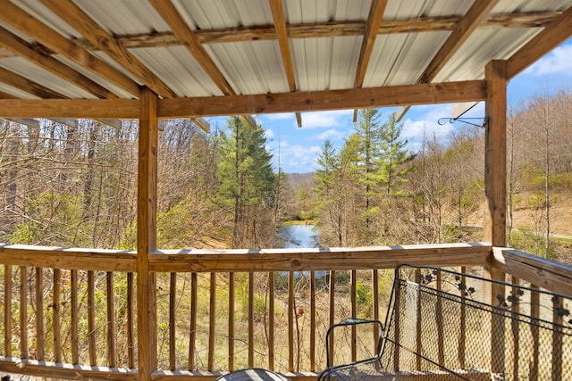 deck featuring a water view