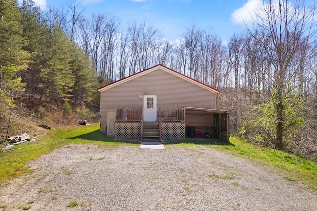 exterior space featuring a carport