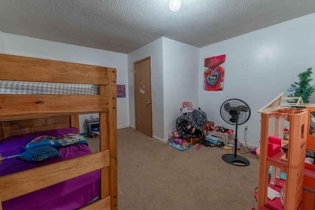 179 Bill Patrick Rd, Whitley City, KY 42653 - carpeted bedroom with a textured ceiling and baseboards