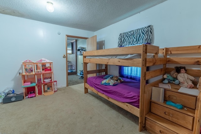 179 Bill Patrick Rd, Whitley City, KY 42653 - carpeted bedroom featuring a textured ceiling