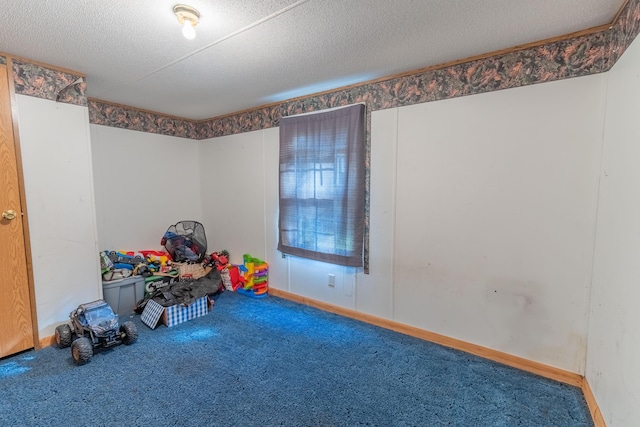 179 Bill Patrick Rd, Whitley City, KY 42653 - recreation room featuring carpet, a textured ceiling, and baseboards