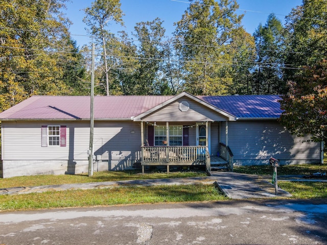 179 Bill Patrick Rd, Whitley City, KY 42653 - single story home featuring a porch and metal roof