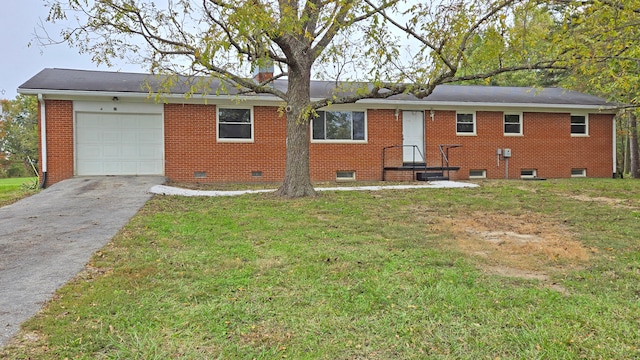 exterior space with a garage and a yard