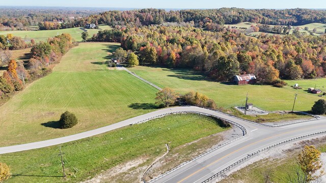 birds eye view of property featuring a rural view