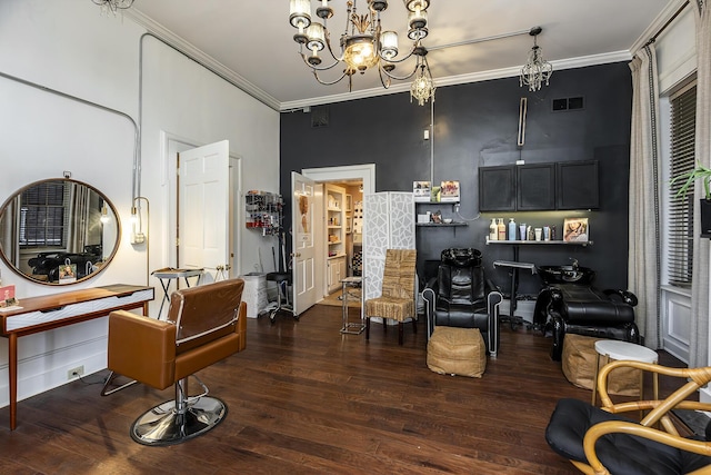 302 W High St, Lexington, KY 40507 - living room with wood finished floors, crown molding, and a chandelier