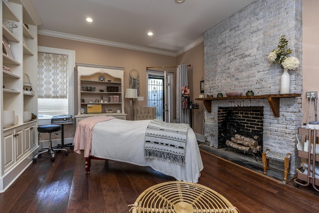 302 W High St, Lexington, KY 40507 - bedroom featuring hardwood / wood-style flooring, crown molding, a stone fireplace, and recessed lighting