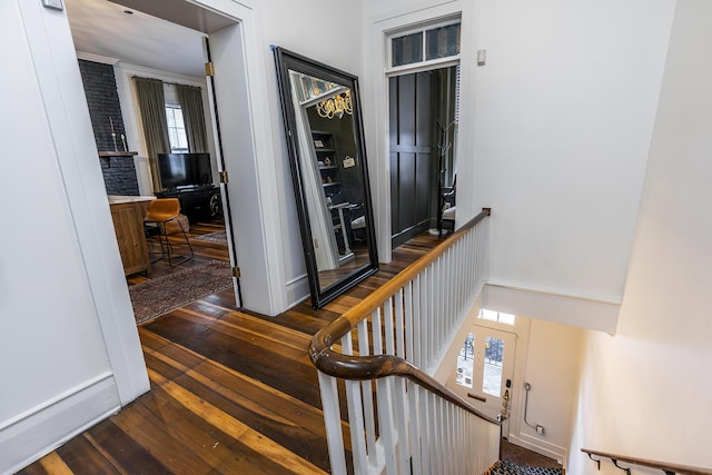 302 W High St, Lexington, KY 40507 - corridor featuring dark wood-style flooring and baseboards