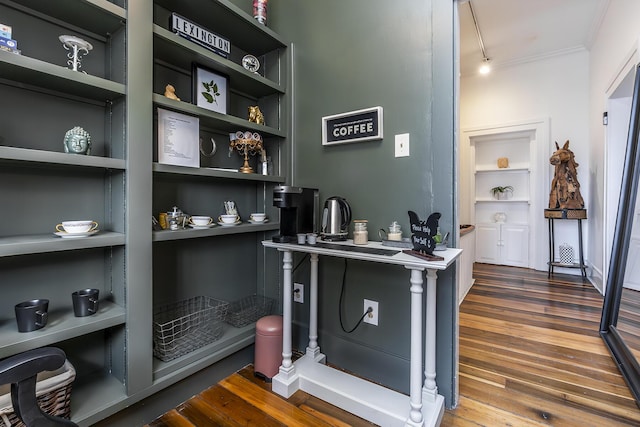 302 W High St, Lexington, KY 40507 - bar area with wood finished floors, ornamental molding, and built in shelves