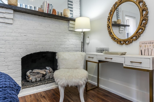 302 W High St, Lexington, KY 40507 - living area with wood finished floors and a fireplace