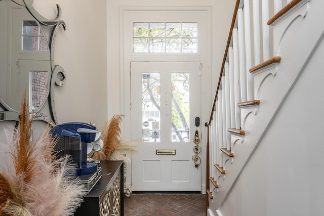302 W High St, Lexington, KY 40507 - doorway to outside with brick flooring and stairway