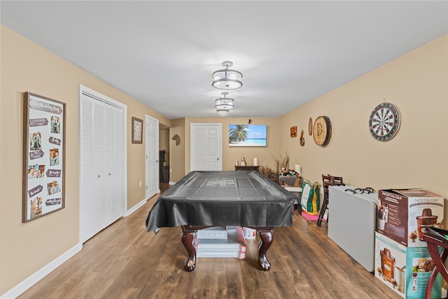 game room with wood-type flooring and billiards