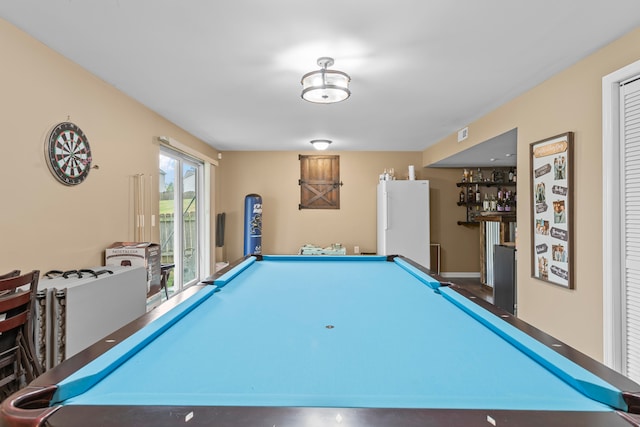 rec room with bar area and billiards