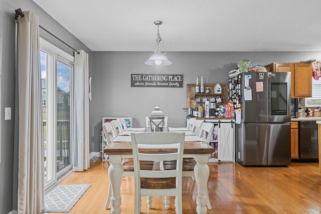 dining room featuring light hardwood / wood-style floors