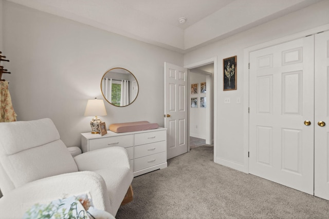 sitting room with light colored carpet