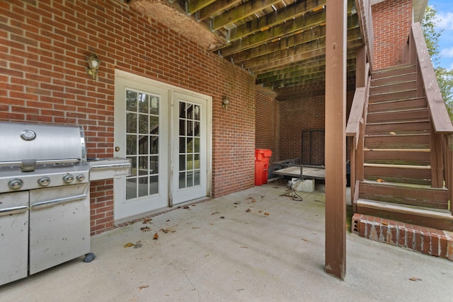 view of patio / terrace with french doors and area for grilling