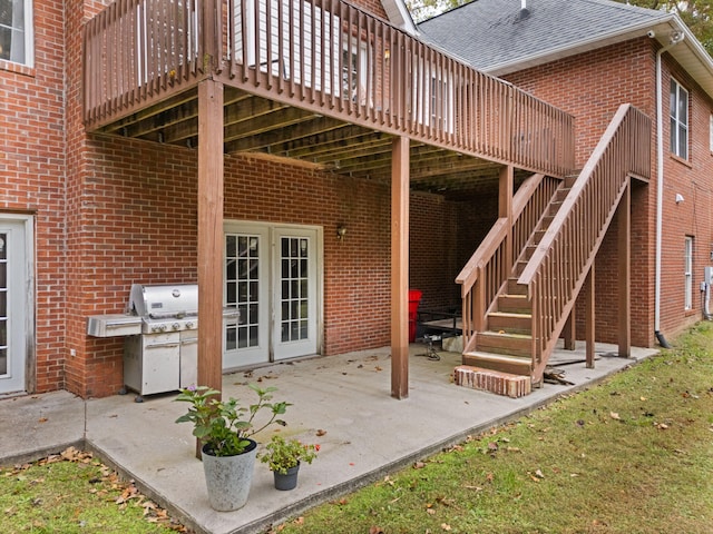 view of patio / terrace with a deck and grilling area