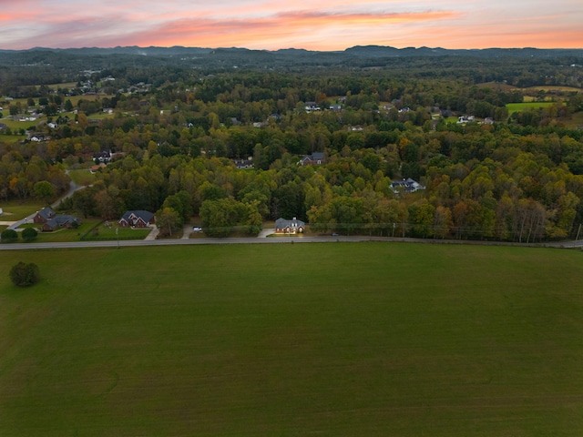 aerial view at dusk with a mountain view